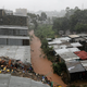 Rains in Nairobi’s Hurama neighborhood where a seven-story residential building collapsed.